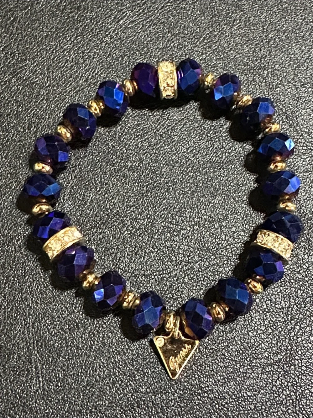 Guess Royal Blue Faceted Crystal Gold Tone Accent Stretch Bracelet